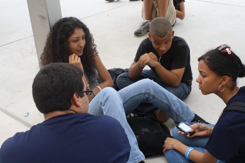 Students converse at lunch while waiting for the bell to ring. Photo by Dottie Lawson
