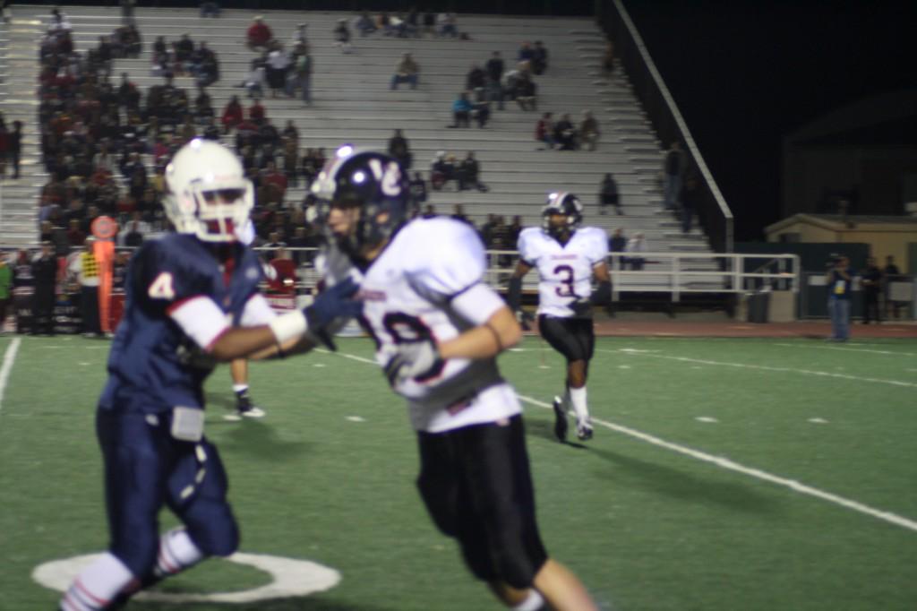 Jakouri Grant, senior, gets ready to run out for a pass against the Churchill corner. Photo by Kristine Williams