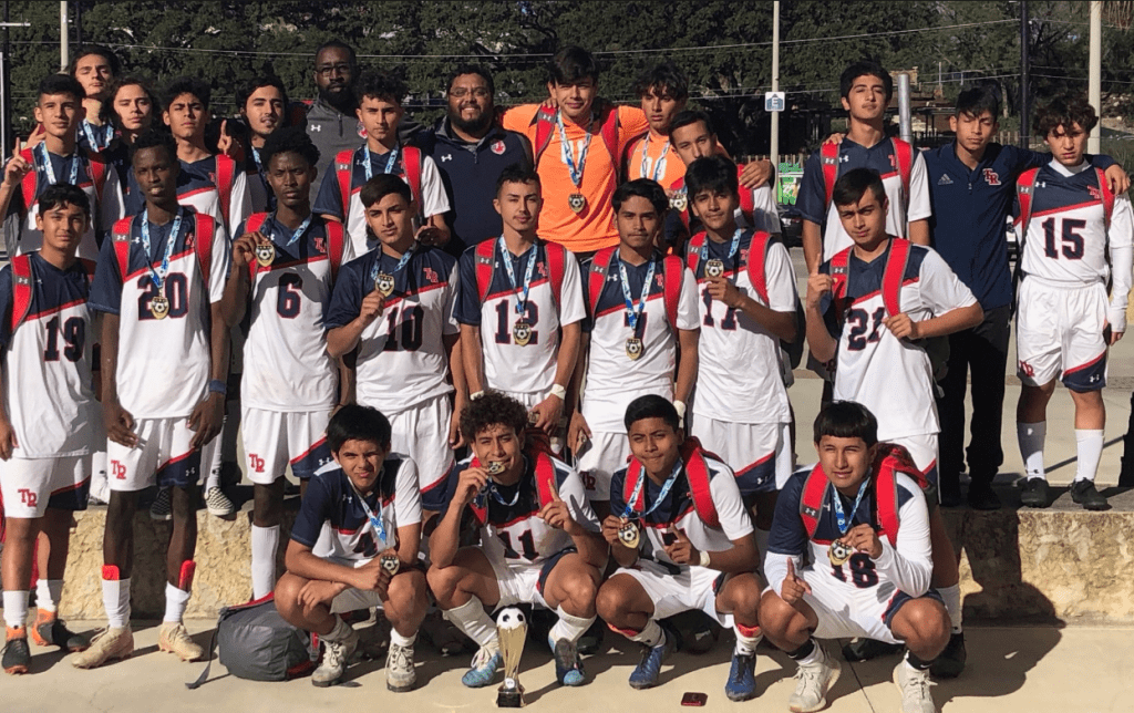 The Varsity Boys Soccer Team poses with their medals after they won the SAISD Tournament. Courtesy Photo.